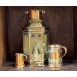 A brass wall-mounted oil lantern by Alderson & Glyde Ltd, Birmingham, 40cm high, together with two