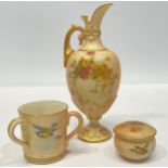 A Royal Worcester porcelain miniature 'blush ivory' ewer decorated with flowers, together with