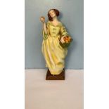 A Royal Worcester porcelain figure of a lady selling oranges 'Sweet Nell of Old Drury Modelled by