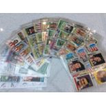 A collection of Sunderland FC related cigarette cards, gum and trade cards featuring former players