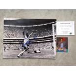 Football legends Carlos Alberto/ Tom Finney Interest, a signed large monochrome photograph of