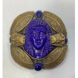 A 1930s gilt metal Egyptian revival style circular brooch probably by Max Neiger (brothers), central