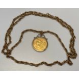 A 22ct gold 1907 half-sovereign, in 9ct gold mount, on 9ct gold chain, gross weight approximately