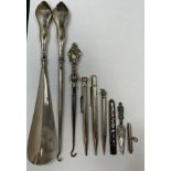 A small collection of assorted silver items comprising various thimbles, one by Charles Horner, a
