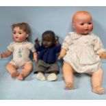 An Armand Marseille bisque headed doll marked '990 A 9 M' to back of head, brown sleeping eyes and