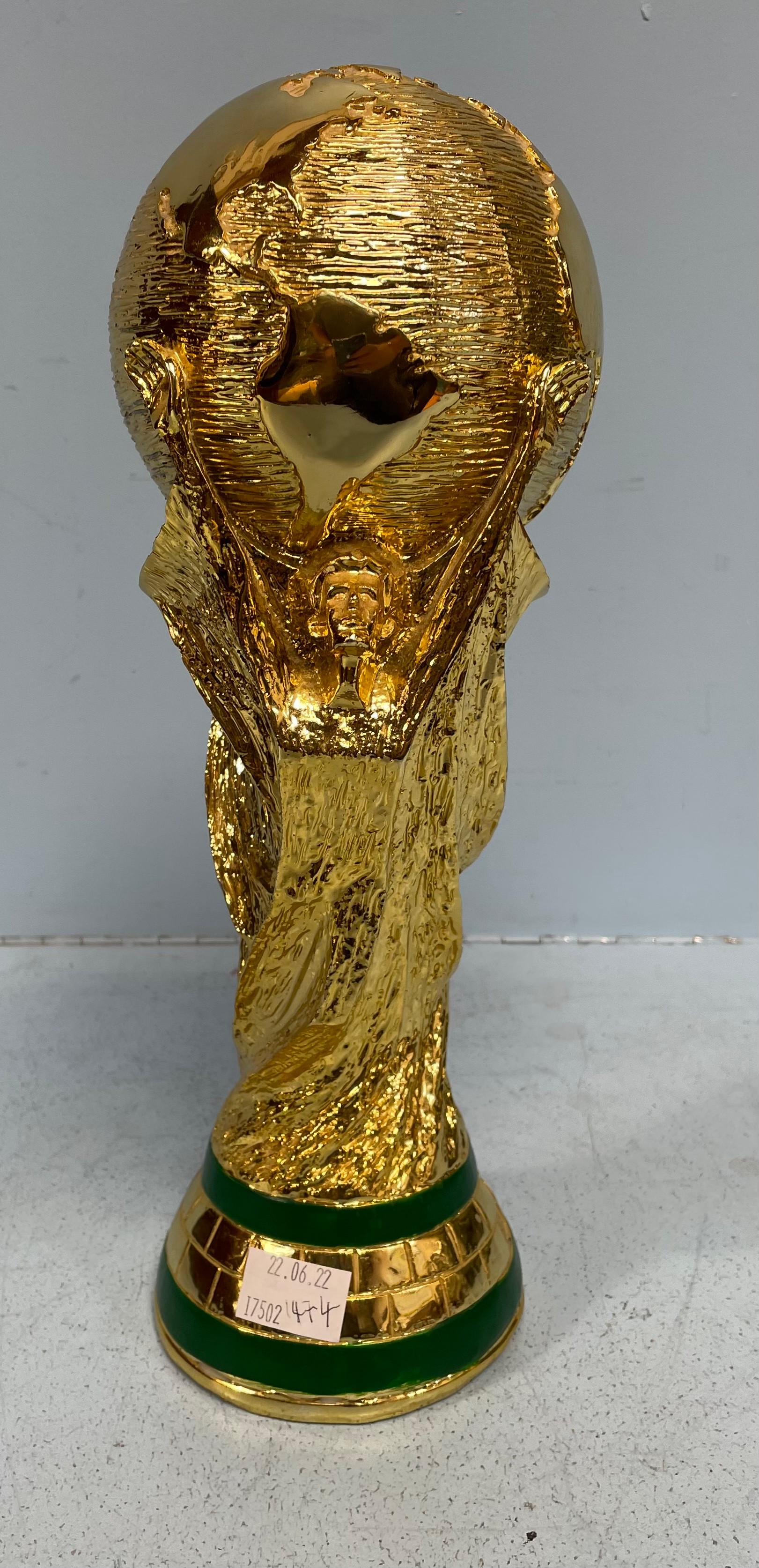 A large replica of the Fifa World Cup trophy, after Silvio Gazzaniga, with two maidens holding a