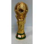 A large replica of the Fifa World Cup trophy, after Silvio Gazzaniga, with two maidens holding a