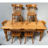 A rectangular scrub-top pine kitchen table of rectangular form with baluster turned supports, and