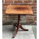 A Georgian rosewood occasional table, of rectangular form, raised on central tapering reeded