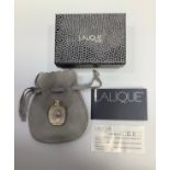 A Lalique 'Flacons de Parfum' brooch modelled as a scent bottle, 3.2cm, with original pouch and