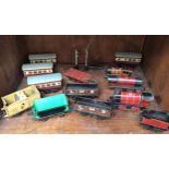 Various Hornby 00 gauge railway including three various clockwork locomotives, 3435 tender,