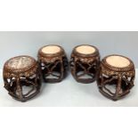 A set of four late 19th century rosewood and mother-of-pearl inlaid barrel seats, with circular