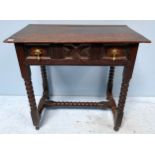 A 17th Century oak side-table of rectangular form, single draw with X shaped moulded central