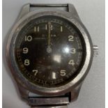 A stainless steel British WWII Military Cyma W.W.W. Wristwatch, C.1945, part of the 'Dirty Dozen',