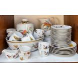 A 90-piece Royal Worcester 'Evesham' pattern part tea and dinner service comprising large bowl,