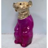 An unusual novelty decanter formed as a bear with cranberry glass body and silvered hinged head,