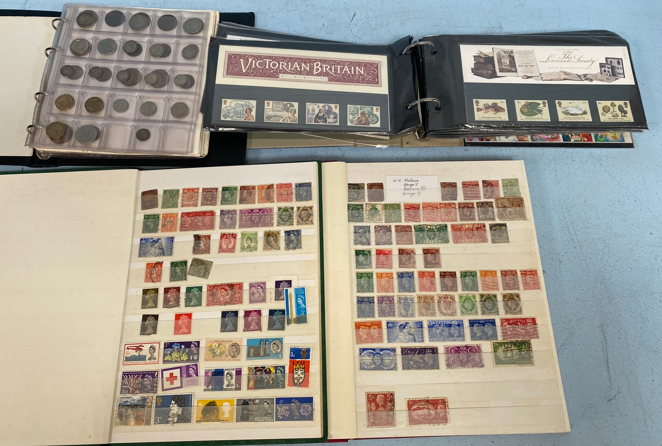 A small quantity of world stamps and coins, including Royal Mail mint, definitives and used etc.