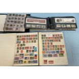 A small quantity of world stamps and coins, including Royal Mail mint, definitives and used etc.