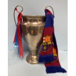A large replica of the European Champions League trophy, 64cm high