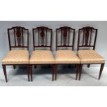 A set of four Edwardian mahogany parlour chairs with boxwood stringing and satinwood cross-