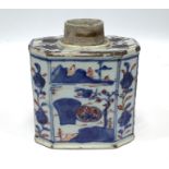 An early 18th century Chinese porcelain canted rectangular tea caddy or canister, painted in