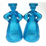 A pair of 1960's Karolinka glass candlesticks modelled as women in Polish dress, designed by Eryka