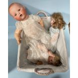 A large Armand Marseille bisque headed doll marked 'AM 351/10K' to back of head, with blue