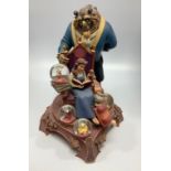 A large Walt Disney 10th Year anniversary edition Beauty and the Beast porcelain figure group with