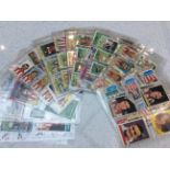 A collection of Sunderland FC related cigarette cards, gum and trade cards featuring former players,