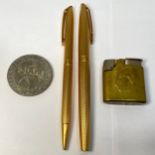 A gold plated Waterman matching pen and pencil with engine turned decoration, together with a 1977