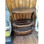 A Victorian walnut shaped oval Canterbury Whatnot, with three-section pierced brass gallery