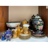 A collection of assorted mixed ceramics comprising a Royal Worcester gold coloured part tea and