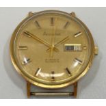 A gents 9ct gold cased Accurist automatic wristwatch, the gilt dial with applied batons denoting