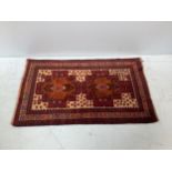 A Caucasian hand-knotted small rug, 138x82cm