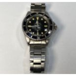 A stainless steel Rolex Submariner model 5513, C.1966, calibre 1520 automatic movement, the black '