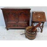 An oak cupboard modelled as a mule-chest, an oak scuttle and a coopered barrel (3)