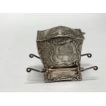 A late Victorian silver novelty miniature card holder cast in the form of a Sedan chair, the cover