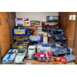 A large quantity of boxed and unboxed diecast model cars and other vehicles of varying scale, to