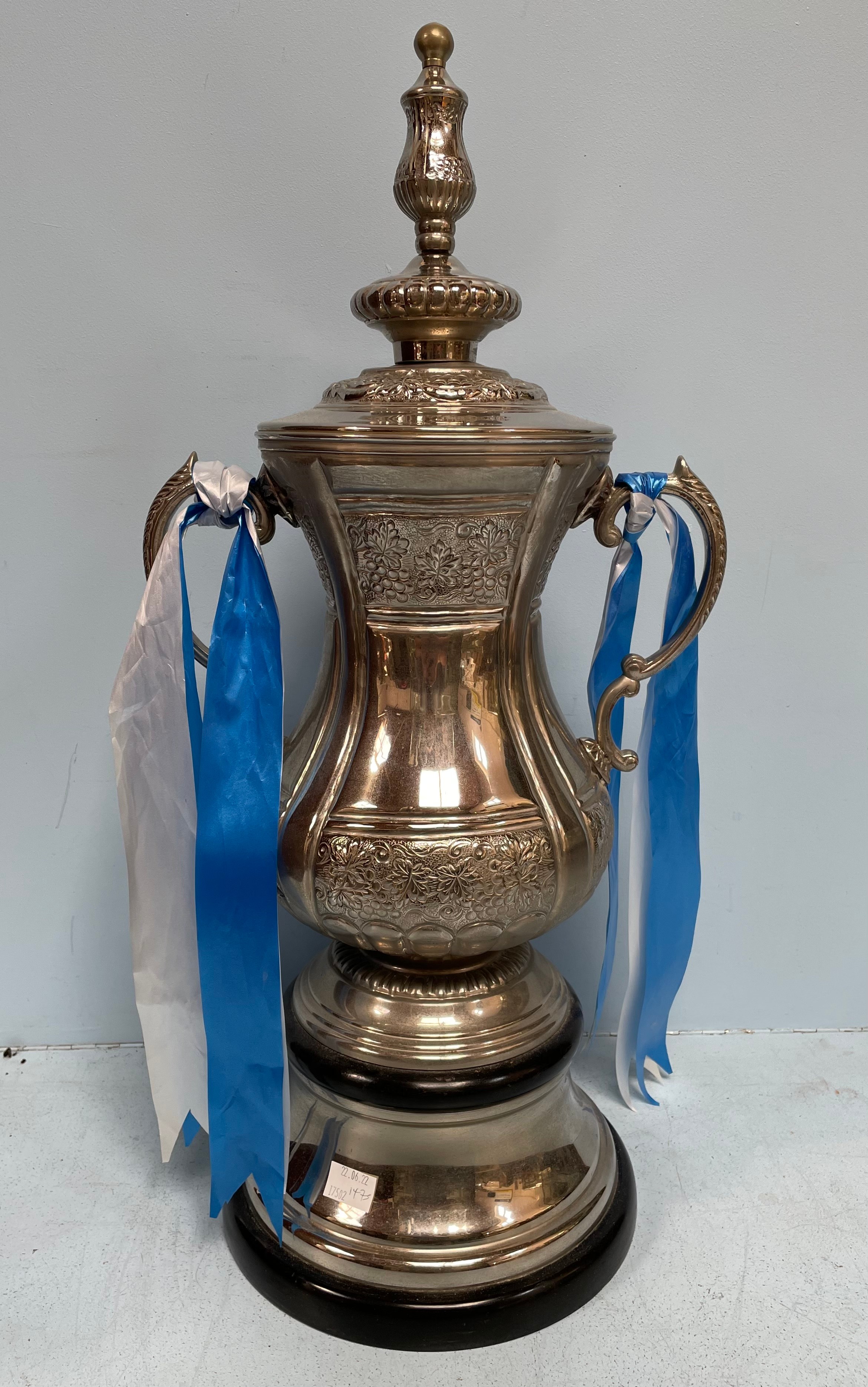 A large white metal replica of the FA Cup trophy, 71cm high