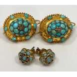 A pair of 15ct gold Victorian earrings set in relief with small central diamond surrounded by