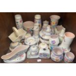 A collection of approximately 35 pieces of Poole Pottery, predominantly CS pattern wares,