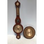 A brass cased cased barometer with silvered dial, maker’s W Greenwood & Sons Leeds & Huddersfield,