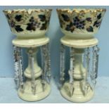 A pair of Victorian opaque pale green glass lustres decorated with blue flowers and dark green