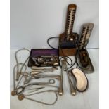 Various vintage medical equipment including blood pressure machine, needles, Otoscopes,