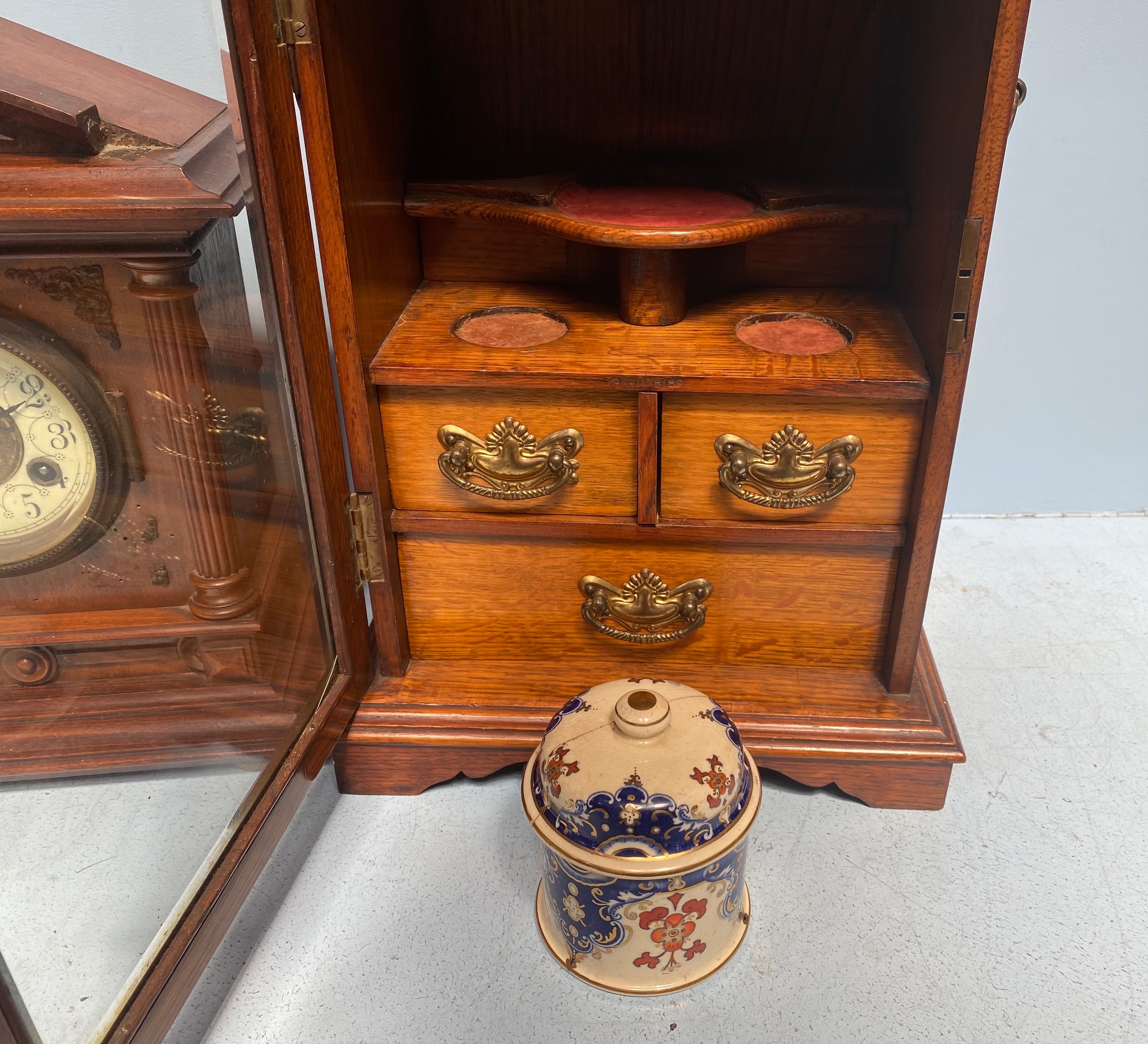 An Edwardian stained oak smoker's cabinet, with single glazed door enclosing drawers and ceramic - Image 5 of 6