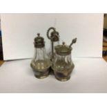 A Victorian three-piece glass and silver-topped cruet set by Robert Hennell III, hallmarked