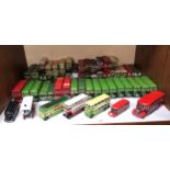 A collection of 57 unboxed die-cast 1:76 scale model buses from various manufacturers, including