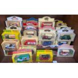 A collection of approximately 93 assorted boxed, die-cast model vehicles by Lledo, including