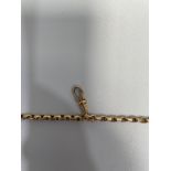 A 9ct gold watch chain, with lobster catch, weighing 34 grams, 60 inches in length.