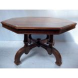 A 19th Century Howard & Sons style octagonal oak supper-table, on unusual turned and shaped base,